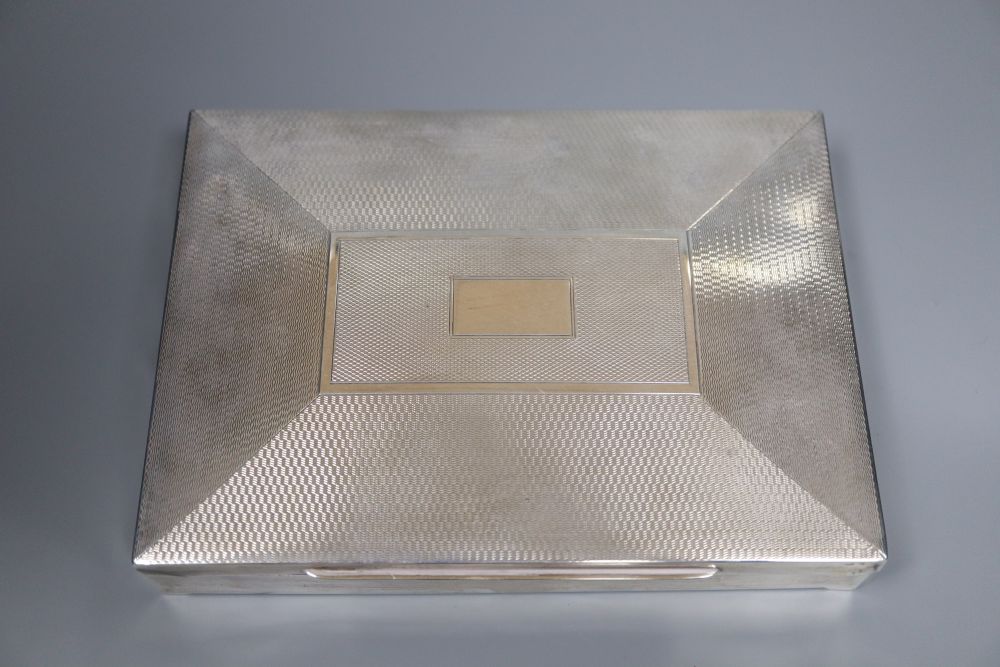 A George V part engine turned silver mounted rectangular cigarette box, William Adams Ltd, Birmingham, 1933, 16.1cm,